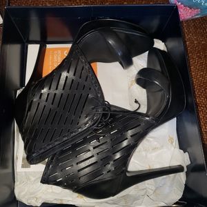 Black, open toe, high heels. Super cute.